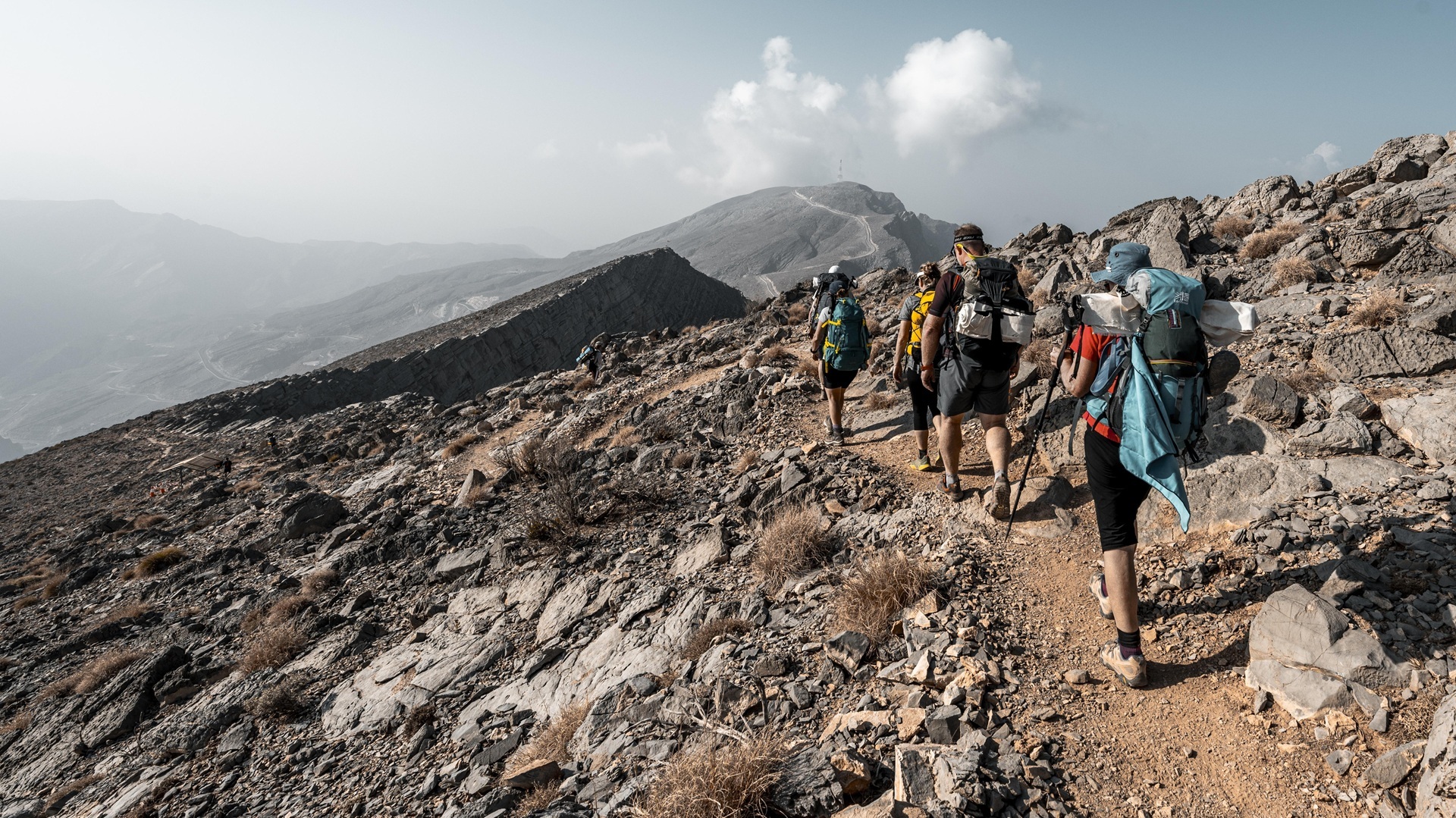 A gourp of hikers atop one of the hills at Jabel Jais in Ras Al Khaimah
