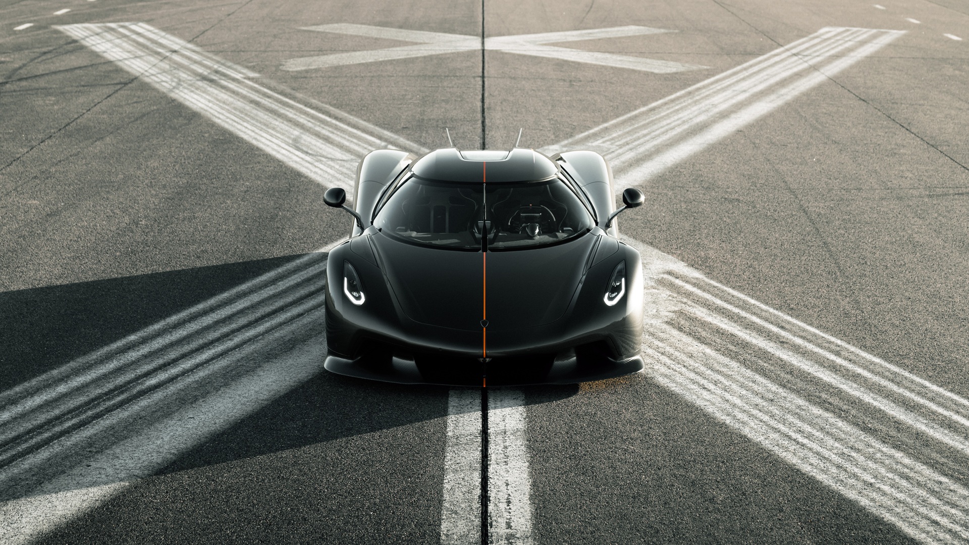 Front static shot of the Koenigsegg Jesko Absolut on a runway.