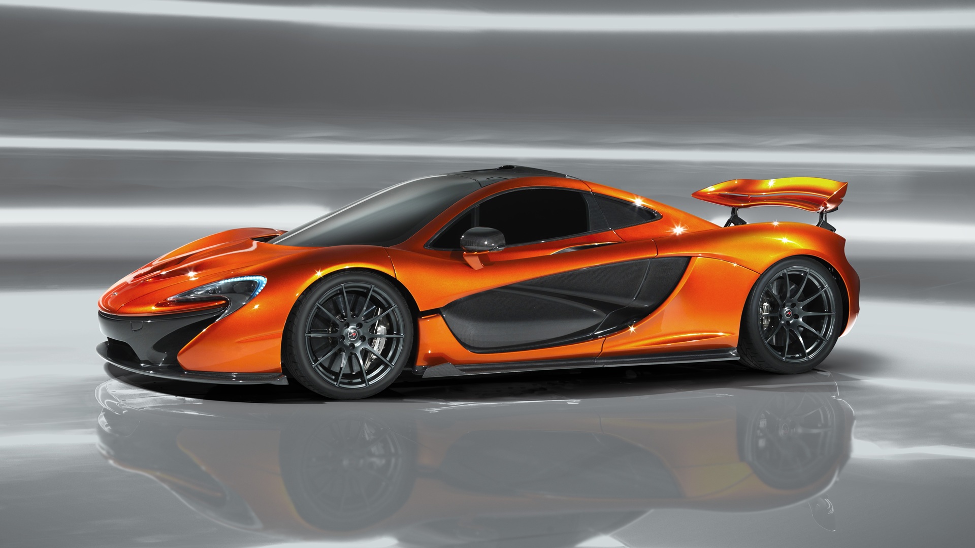 Side profile of an orange McLaren P1
