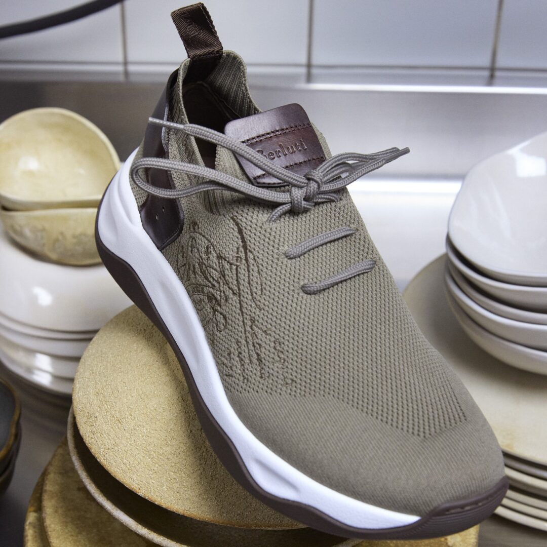 Close-up shot of the right side of the Berluti Shadow Sneaker in Light Kaki shade.