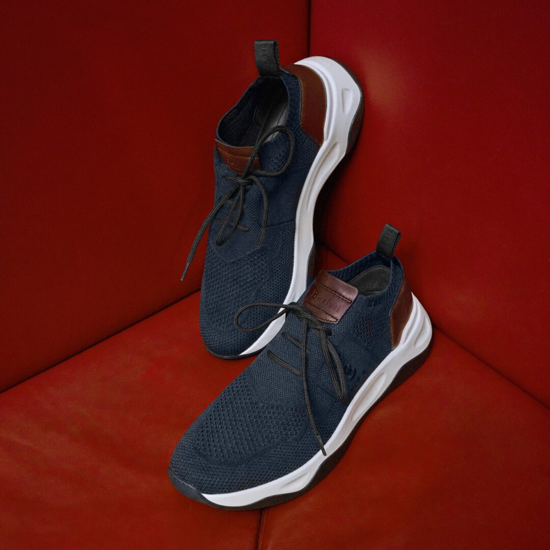 Close-up shot of the Navy-coloured Berluti Shadow Sneaker