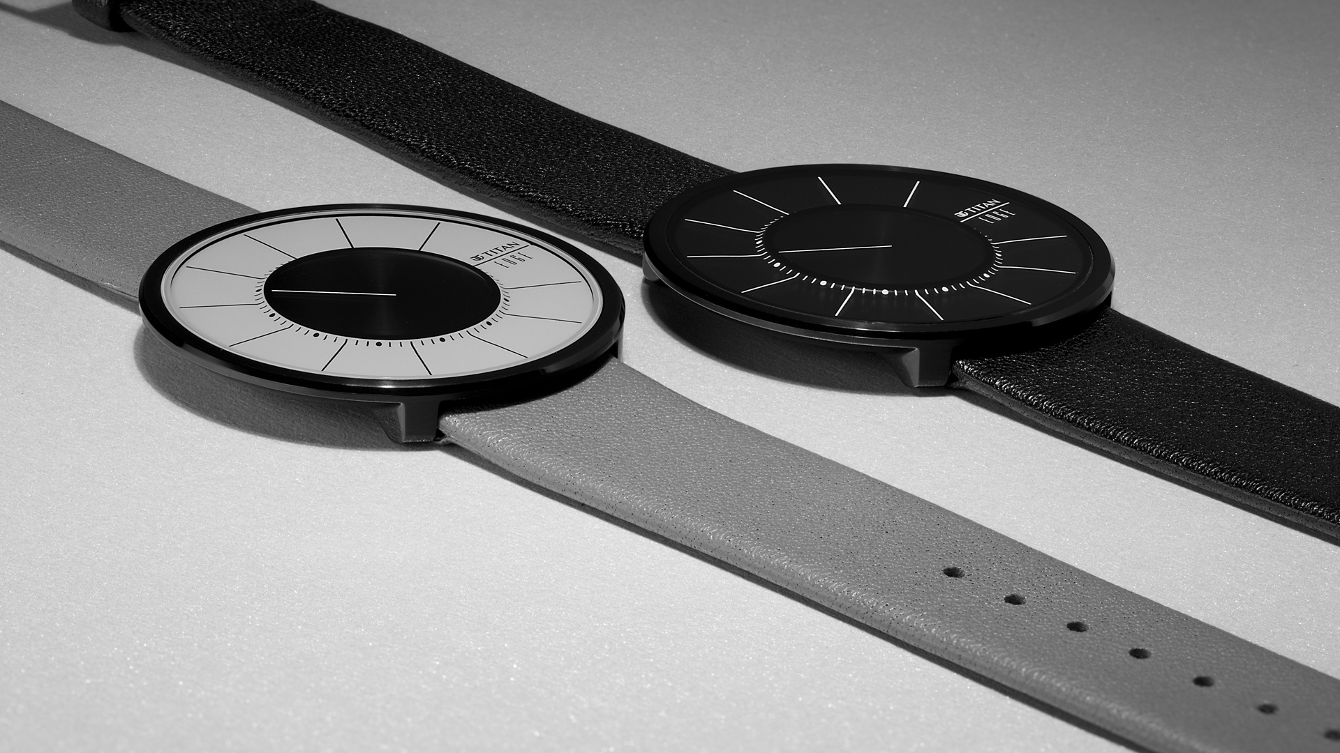 The Edge by Titan UltraSlip grey and monochromatic black dial versions.