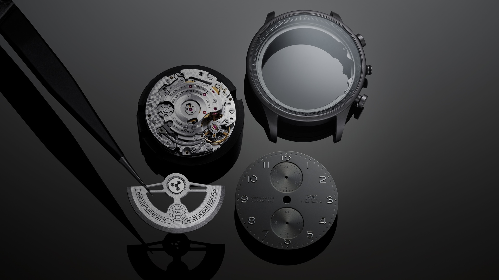 The dial, case, movement, and automatic winding rotor of the IWC Schaffhausen Portugieser Chronograph Ceratanium.