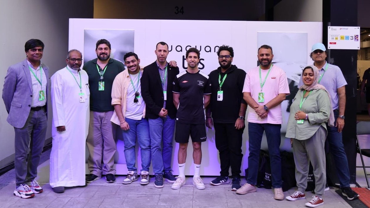 Team TCI, represented by Shivaum Punjabi, with members of the Jaguar TCS Racing team.