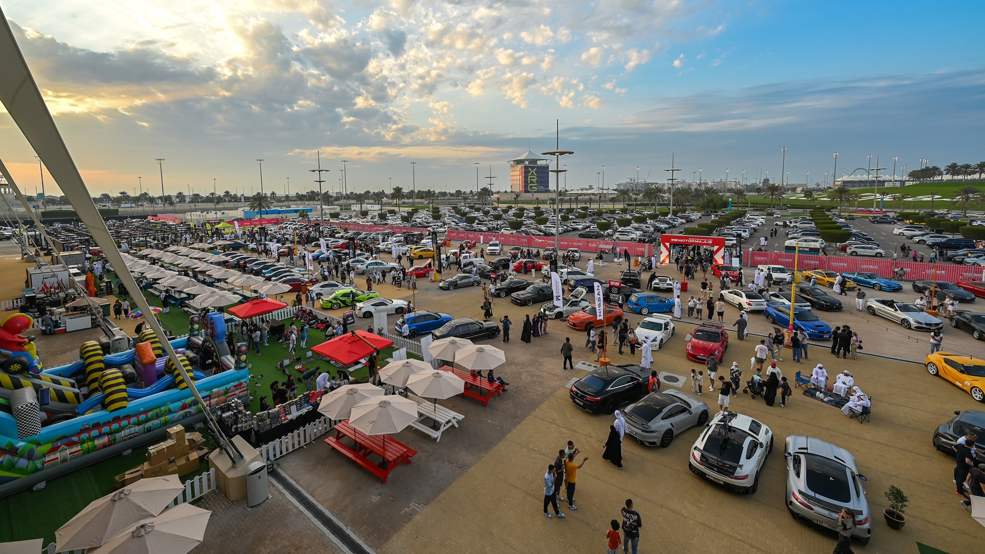 Wide shot of the gathering of cars and people during Yas Speed Festival