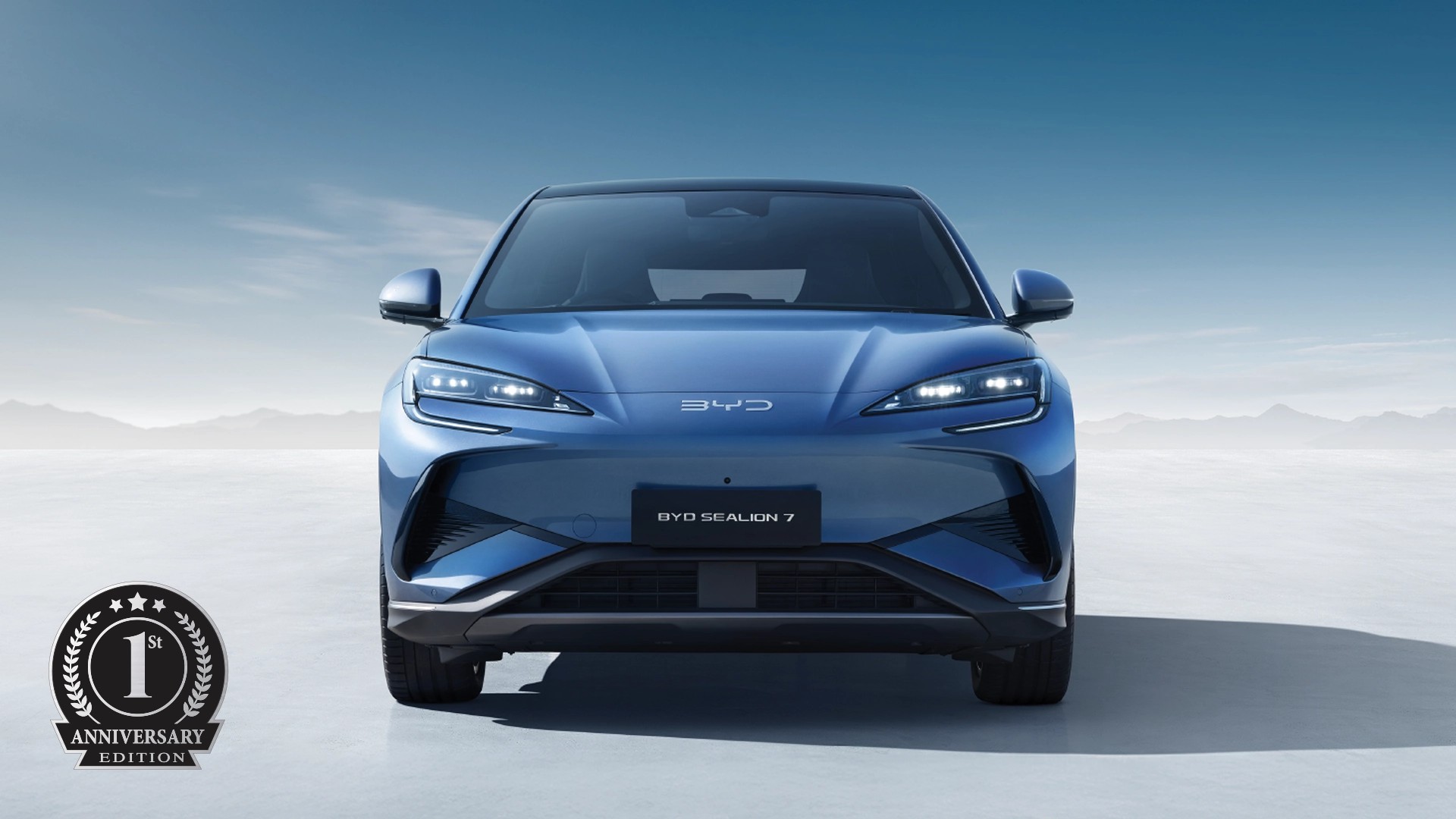 A photograph of the BYD Sealion 7 First Anniversary Edition in Atlantis Gray, taken from the front.