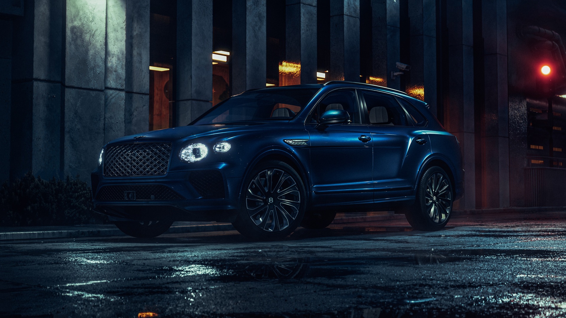 Static image covering the front three-quarters of a Sequin Blue Bentley Bentayga Artenara