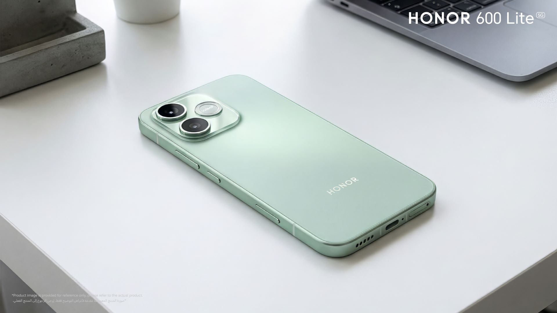 A Sprout Green Honor 600 Lite, kept with its face down on a table.