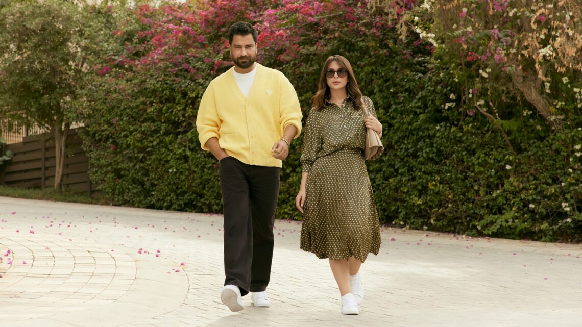 Two models showcasing select pieces from the latest Lacoste Ramadan Edit