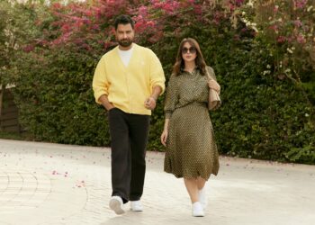 Two models showcasing select pieces from the latest Lacoste Ramadan Edit