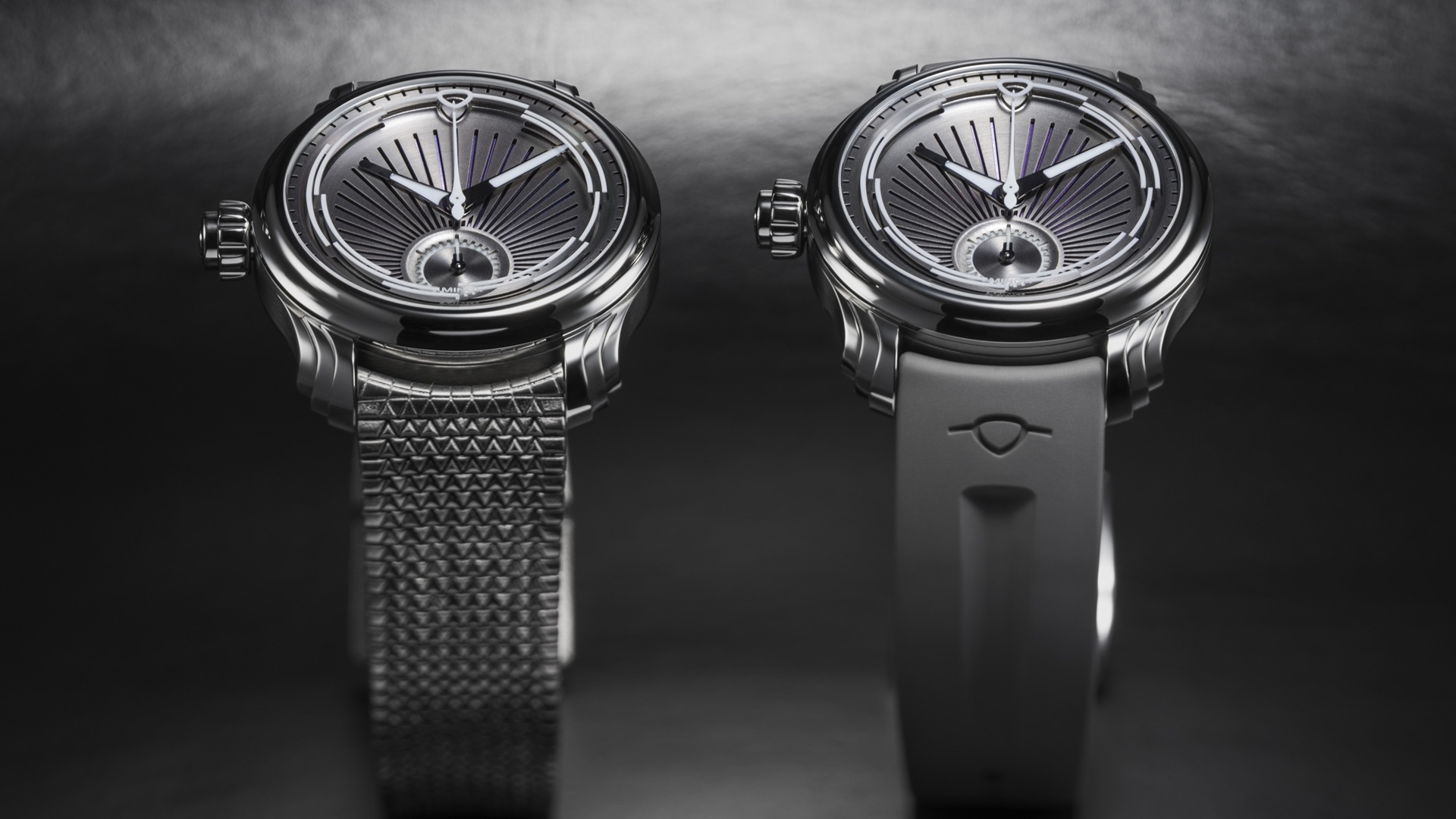 The MING 57.04 Phoenix with both bracelet and strap options. Left is the titanium polymesh and right is the FKM grey rubber strap.