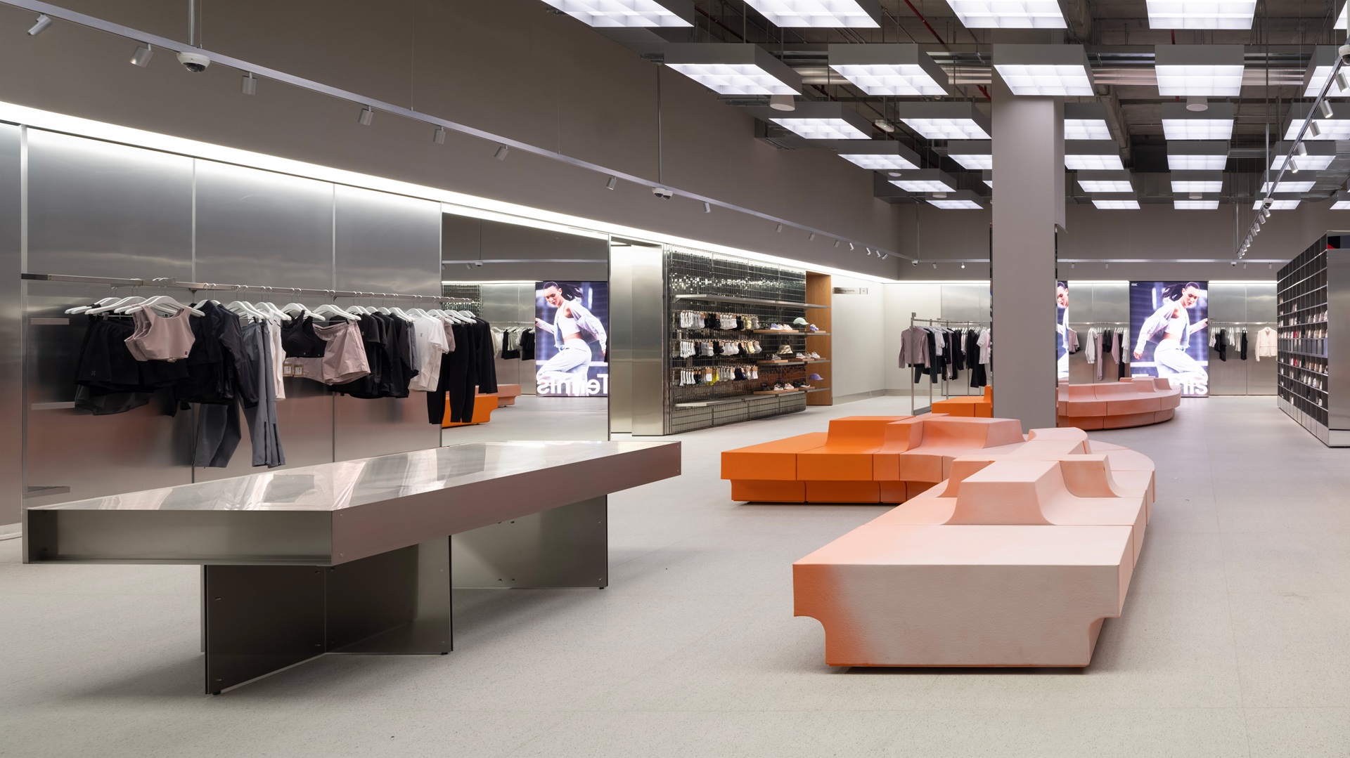 Wide-shot of the interior ambience, colour theme and product range inside the new On store in The Avenues Mall in Kuwait