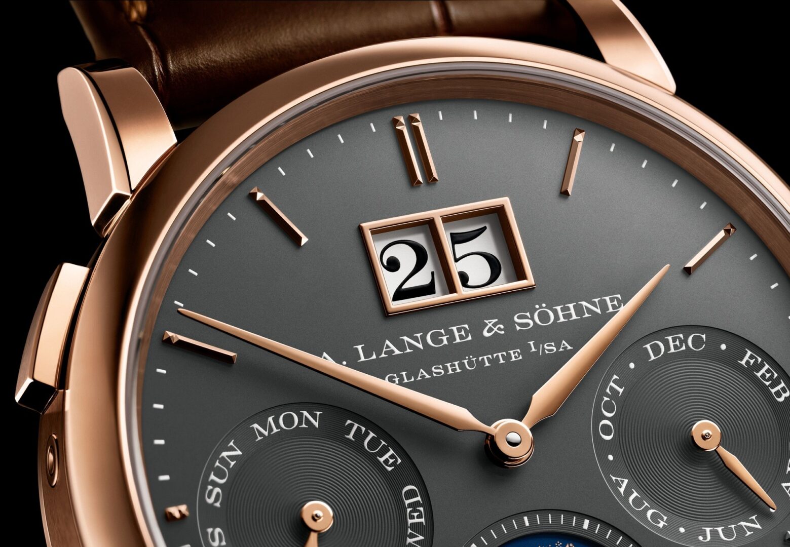A. Lange Sohne Saxonia Annual Calendar grey dial in pink gold case.