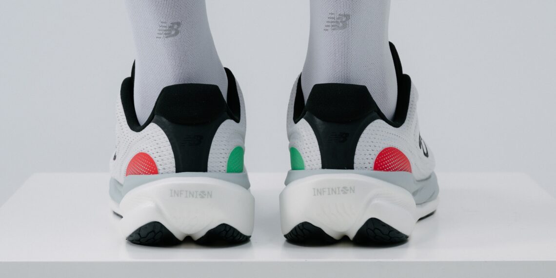 A rear shot of the New Balance 1080v15, on a model's feet.