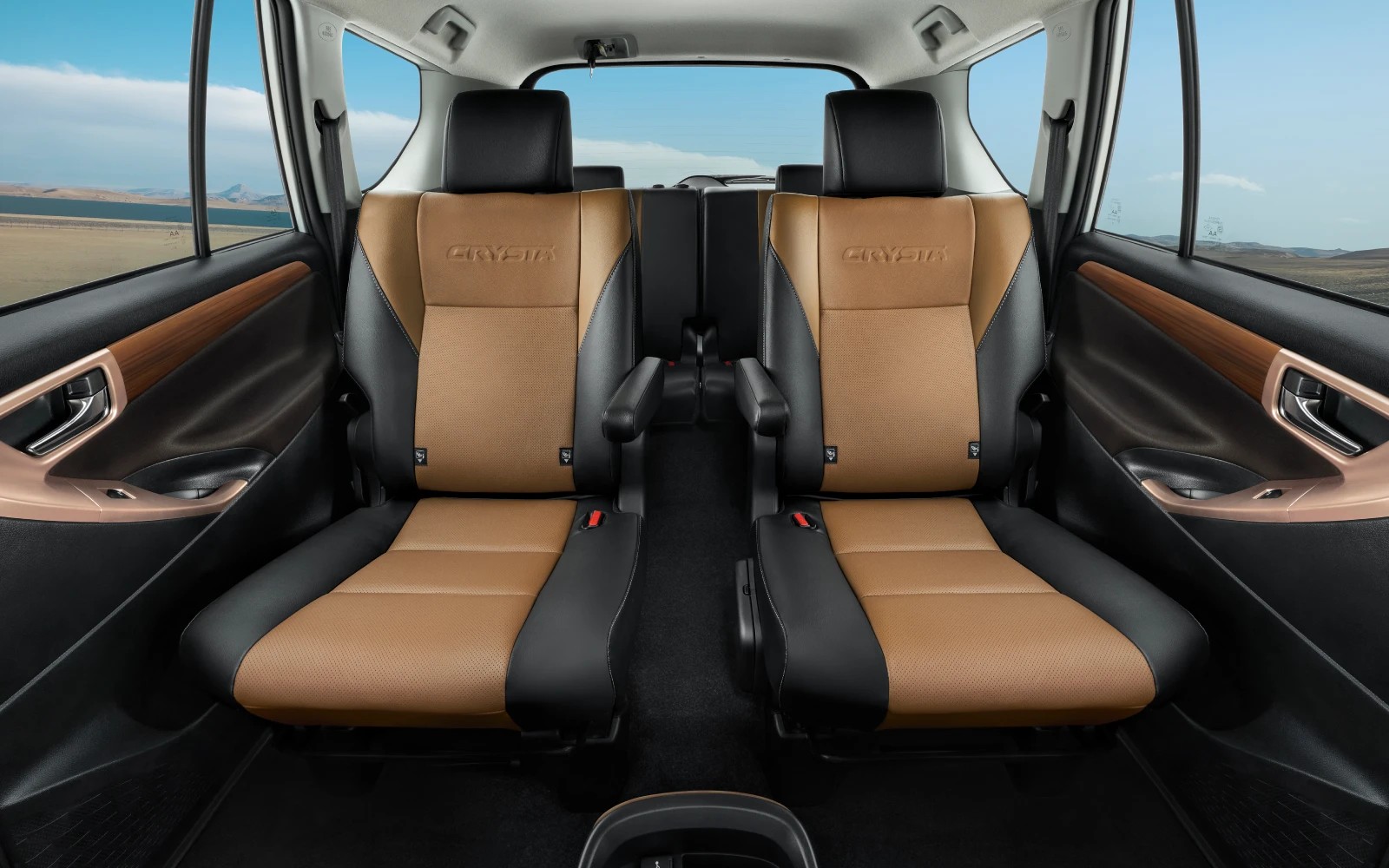 The dual-tone upholstery inside the 2026 Toyota Innova Crysta, with a focus on the rear seats