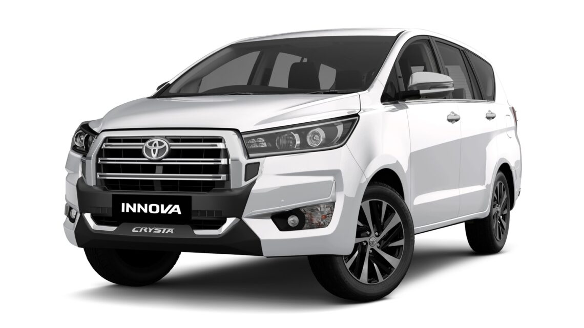 An image taken from front-right side of the 2026 Toyota Innova Crysta in Super White colour