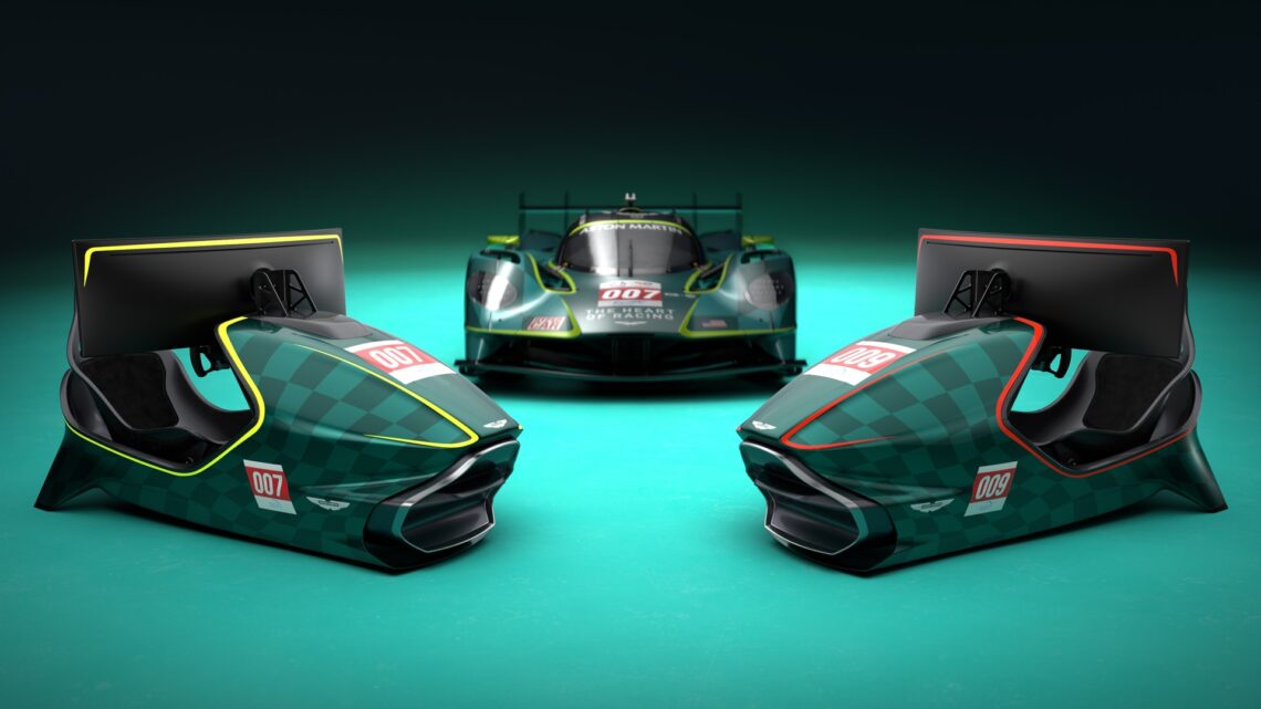 The two versions of the Aston Martin Valkyrie Simulator - 007 and 009 - with a Valkyrie hypercar in the back. The limited-run variant is the AMR-C01-R Hypercar Edition.