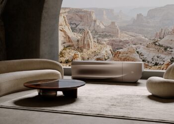The C SEED BUGATTI N1 - positioned as a sideboard in a living room with hills in the backdrop