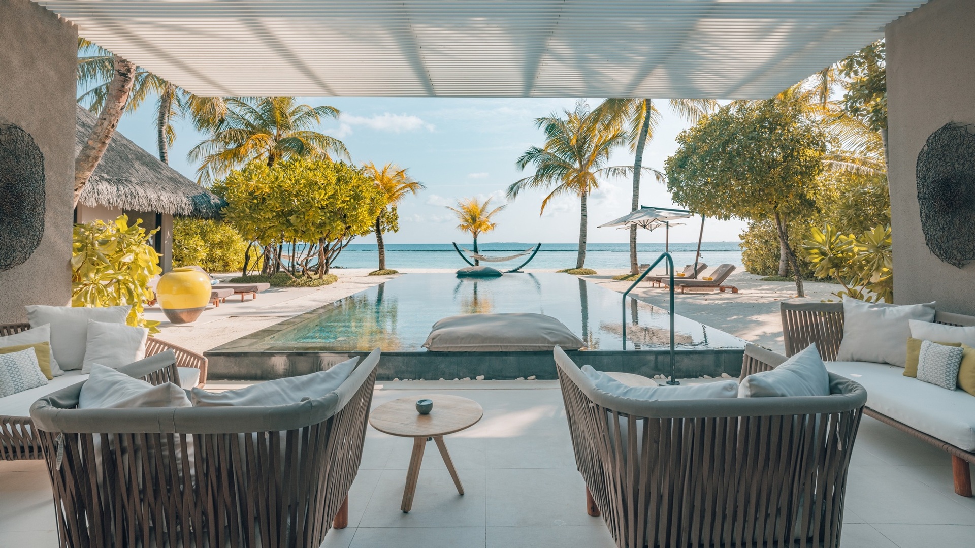A wide-angle shot of the private swimming pool at the Island Villa at Cheval Blanc Randheli