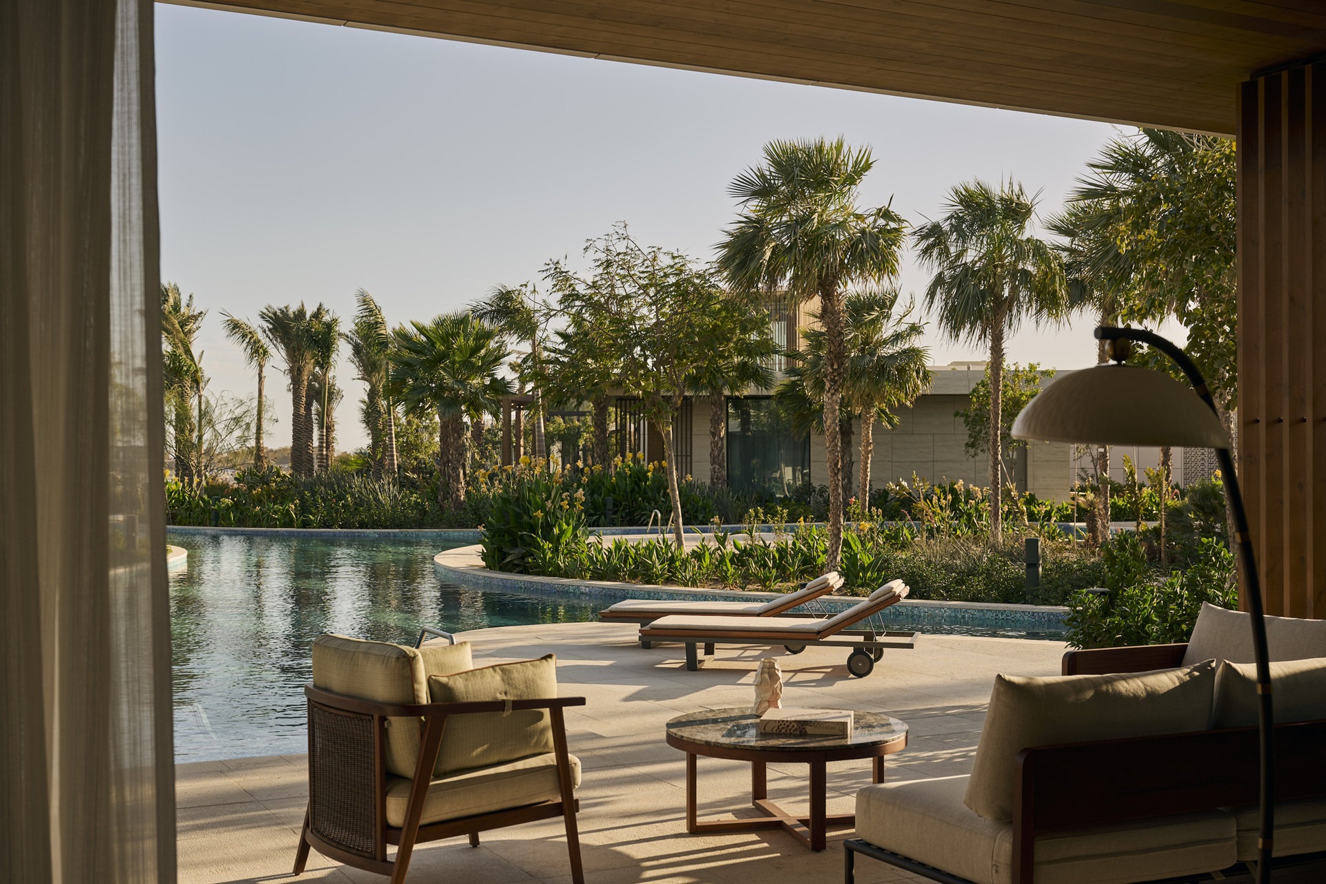 The pool side area at the Four Seasons Resort and Residences AMAALA at Triple Bay