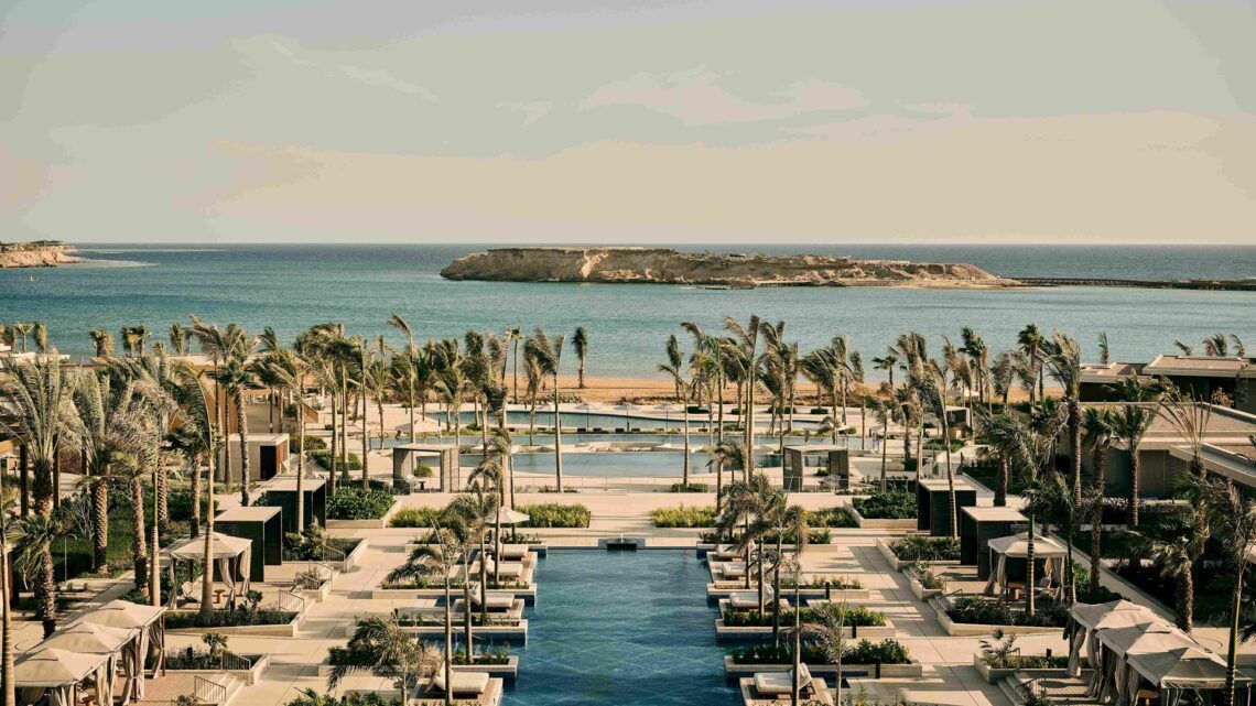 An aerial wide shot of the Four Seasons Resort and Residences AMAALA at Triple Bay
