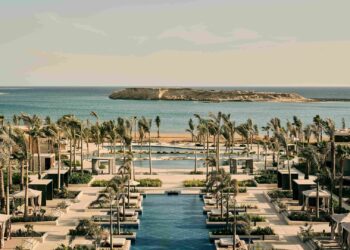 An aerial wide shot of the Four Seasons Resort and Residences AMAALA at Triple Bay