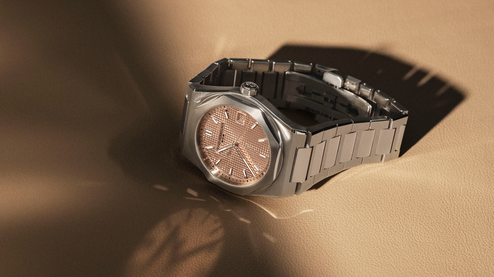 Girard-Perregaux Laureato FIFTY 39 mm with gold dial.
