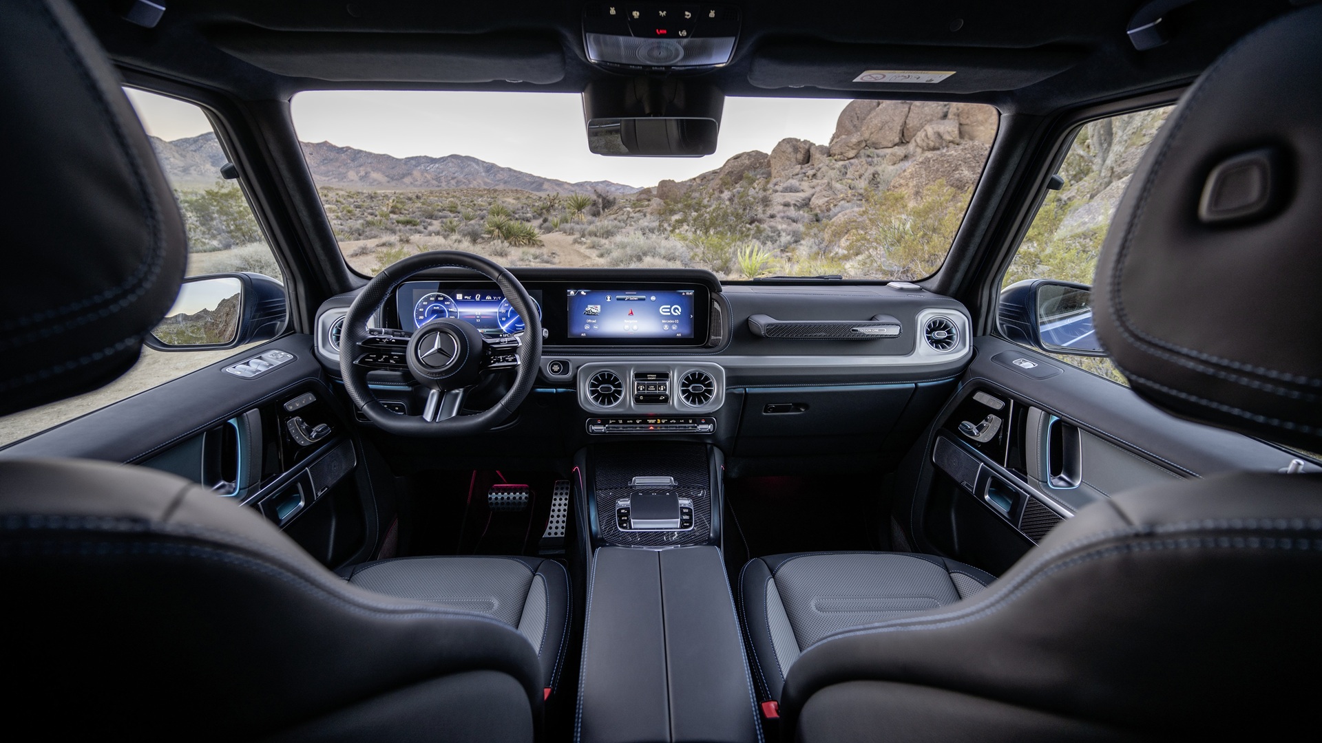 Interior shot of the dashboard, taken from the rear seat, of a Mercedes-Benz G 580, the Electric G-Wagen
