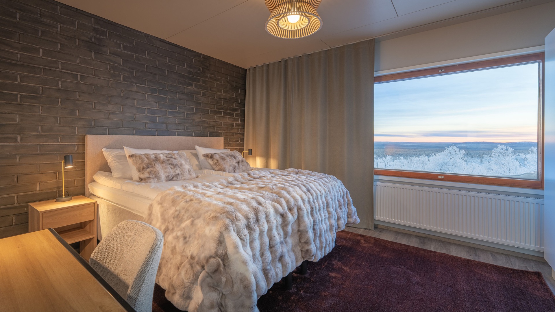 One of the bedrooms, with a double bed, at Octola III