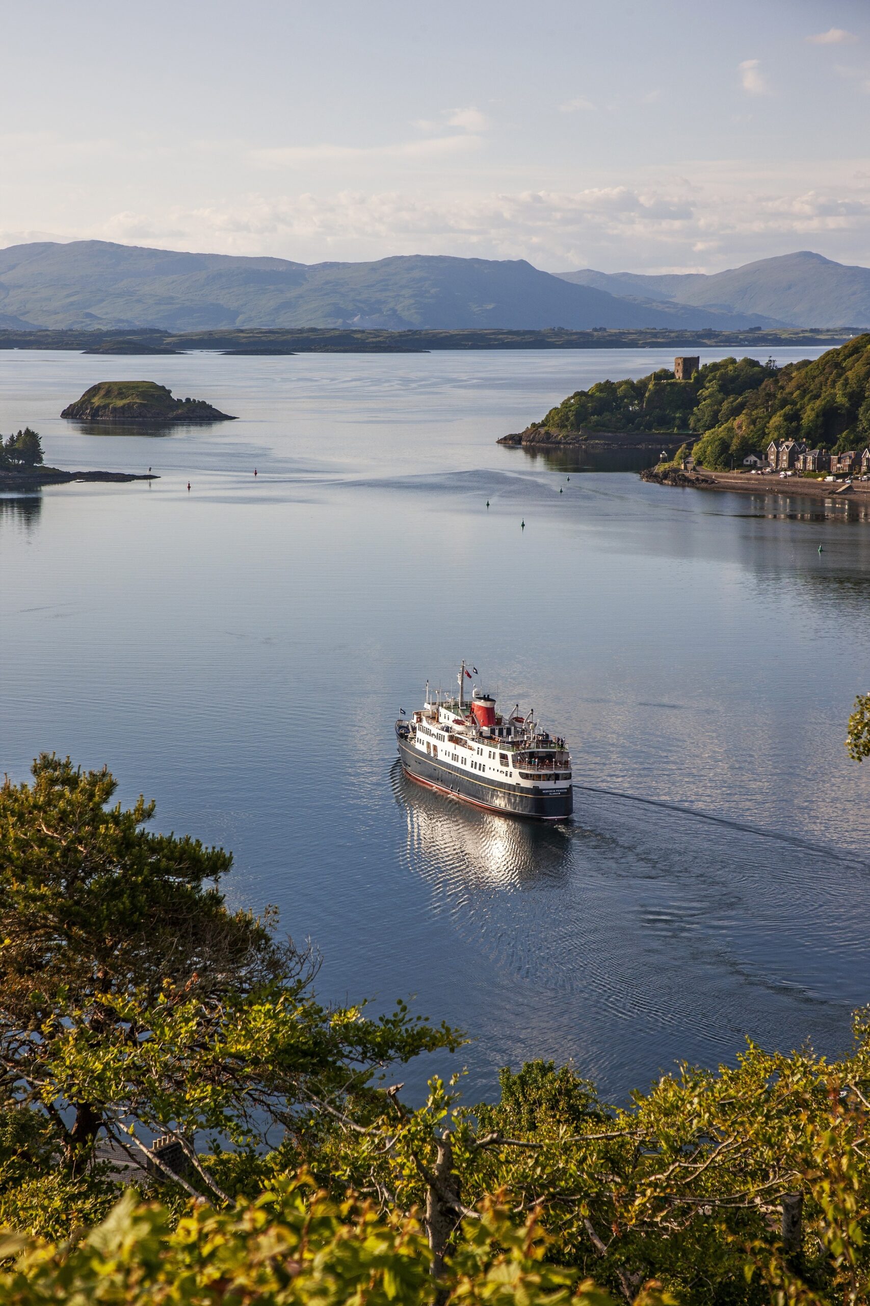 A vertical wide shot of the Hebridean Princess sailing, PoB Hotels