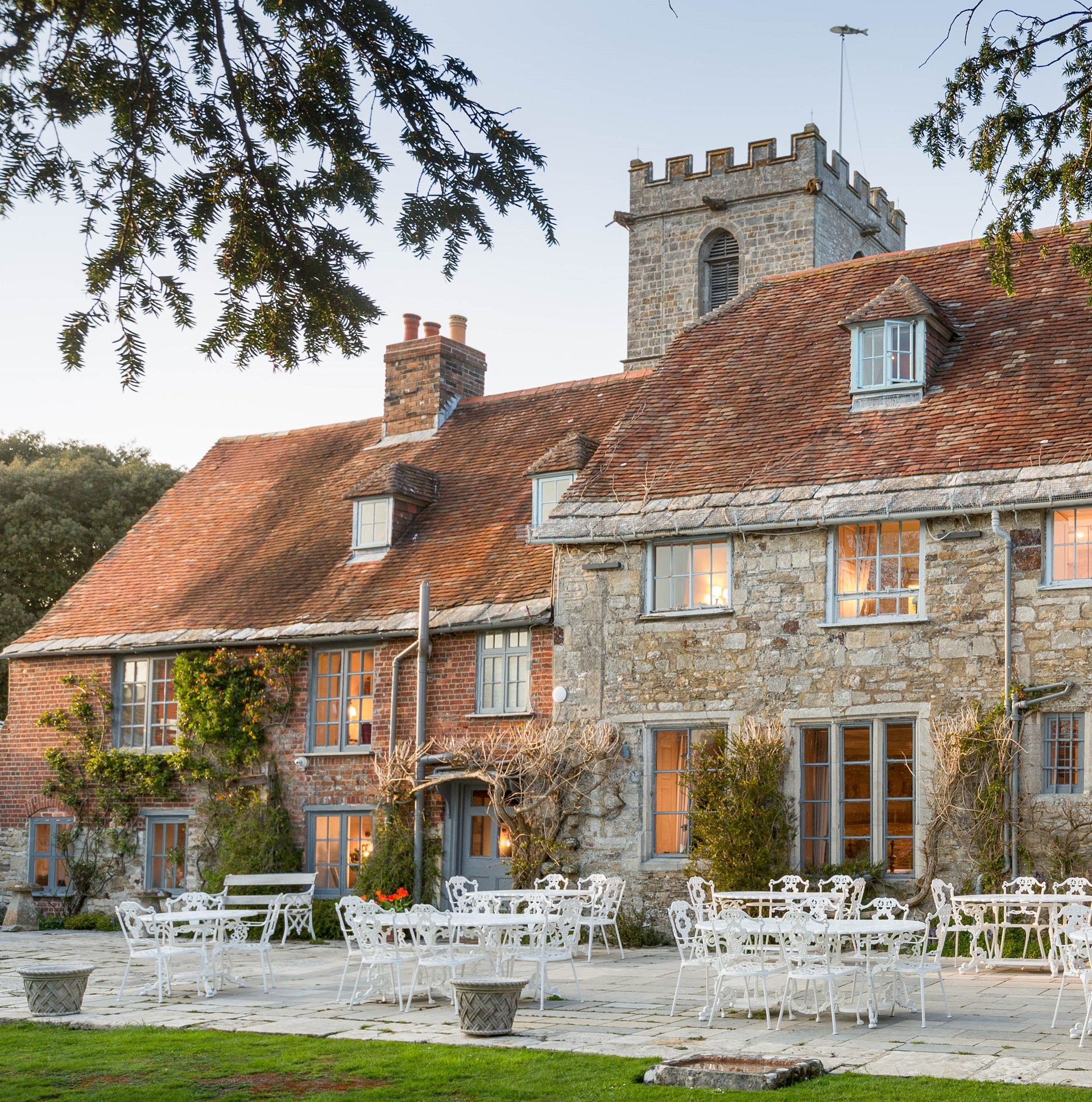 An exterior photograph of a part of The Priory, PoB Hotels