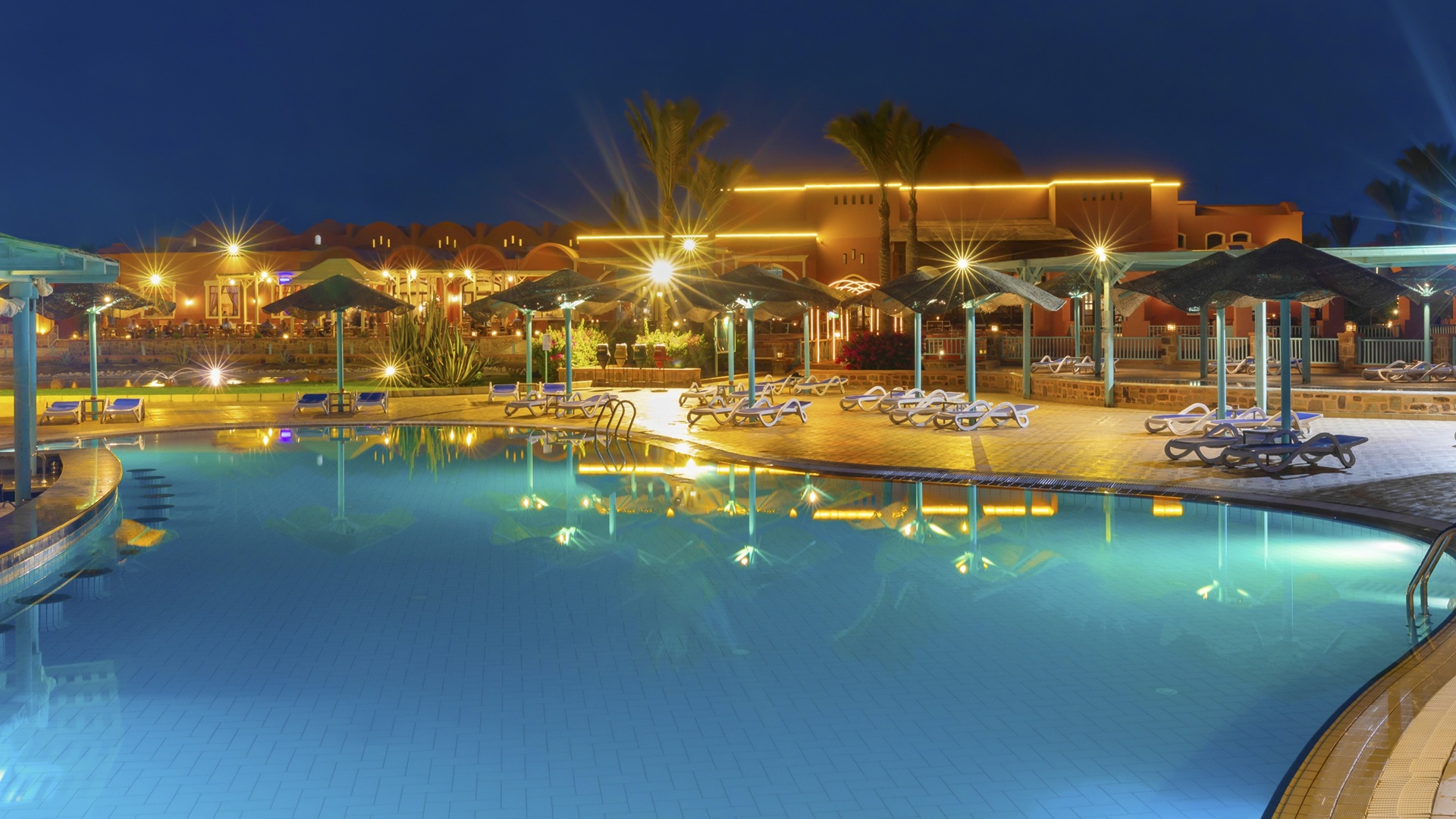A wide shot of the swimming pool at the Swissôtel Resort El Quseir in Egypt
