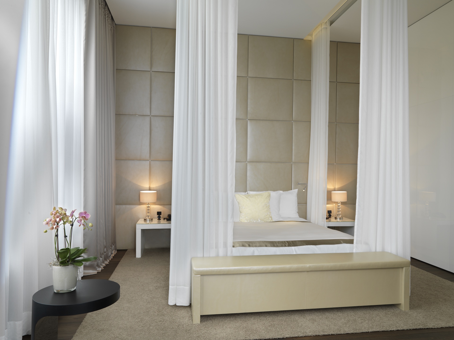 An image of the bedroom inside the Maestro Suite at The Dolder Grand Zurich