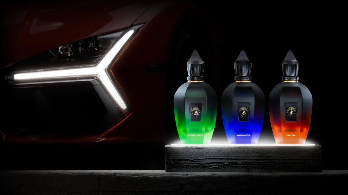 The complete Xerjoff Automobili Lamborghini Fragrance Collection, comprising Avanguardia, Fierezza, and Perseveranza, with a Lamborghini in the background