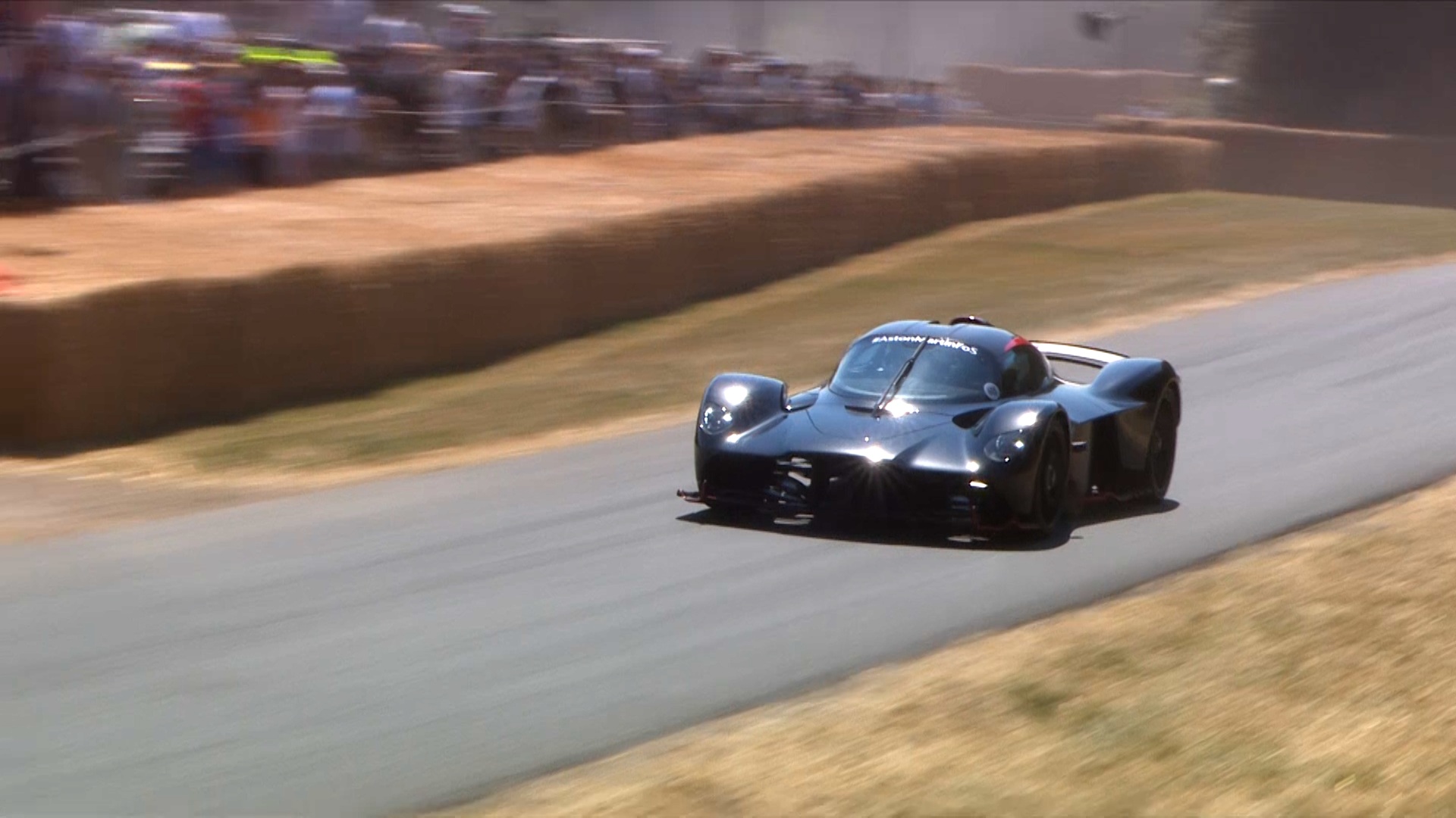 A dynamic shot of the Aston Martin Valkyrie at the Hill Climb at the Goodwood Festival of Speed 2026
