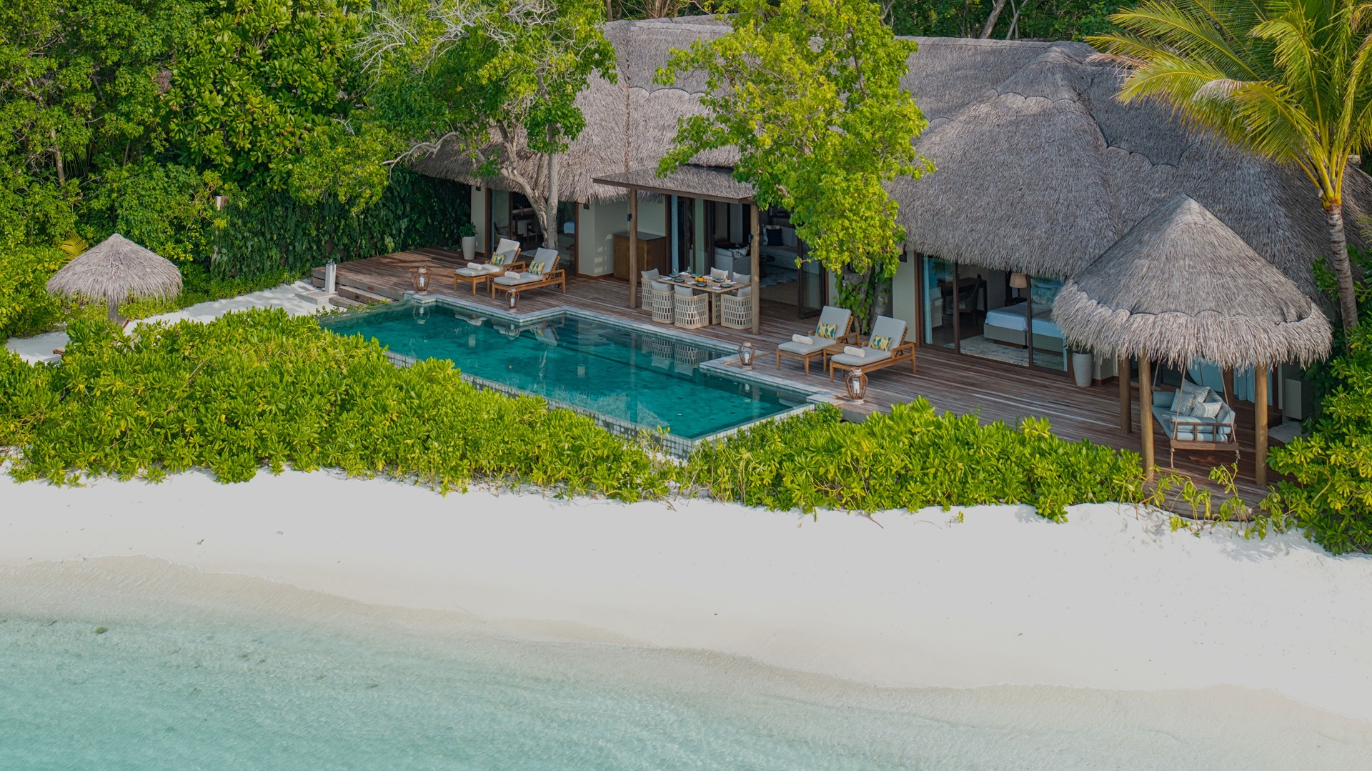 An exterior aerial shot of the Baros Retreat, part of Baros Maldives Villas