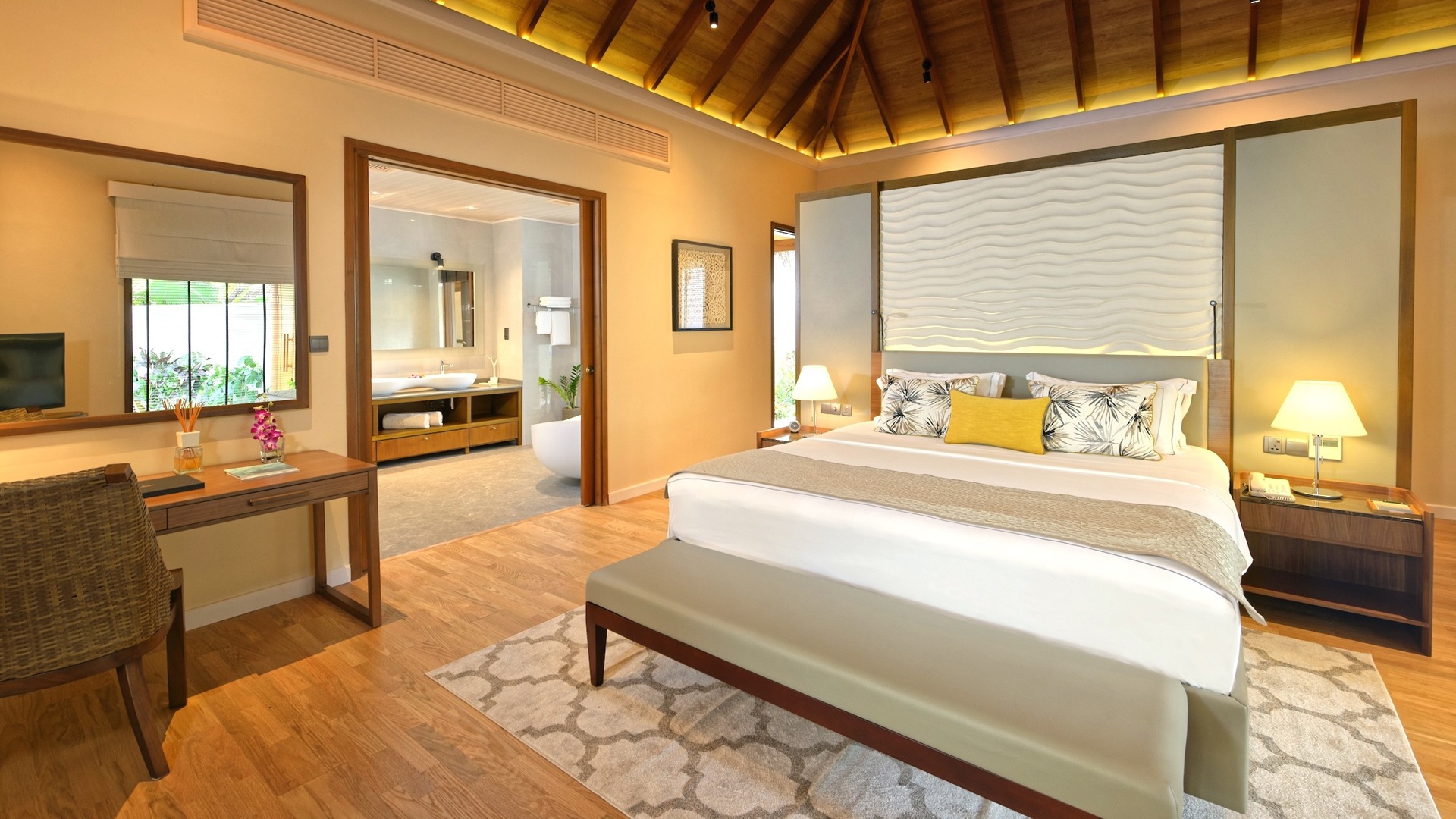 The bedroom inside a Baros Residence, part of Baros Maldives Villas