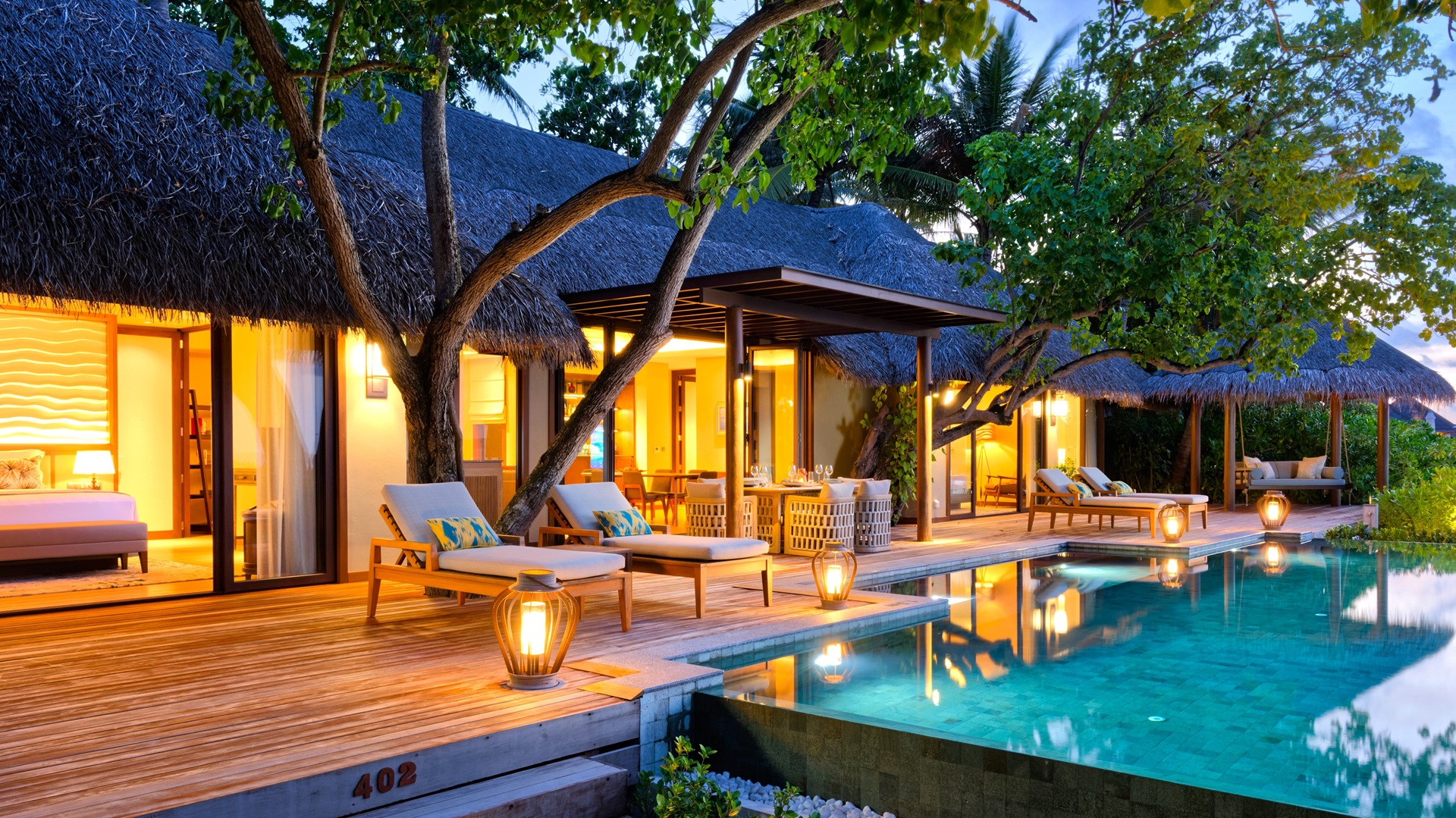 The backside of the Baros Retreat villas with swimming pool, part of Baros Maldives Villas