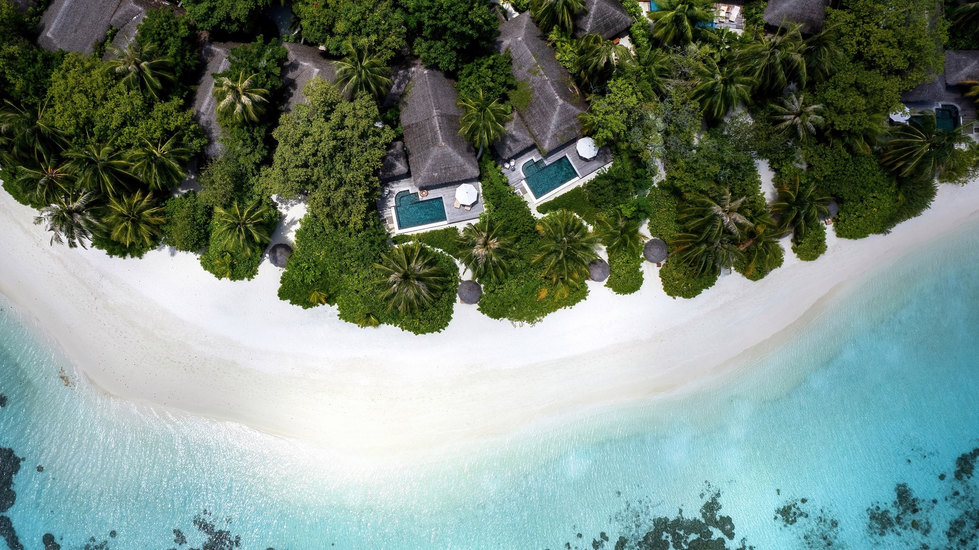 An aerial shot of the Baros Suite cluster, part of Baros Maldives Villas