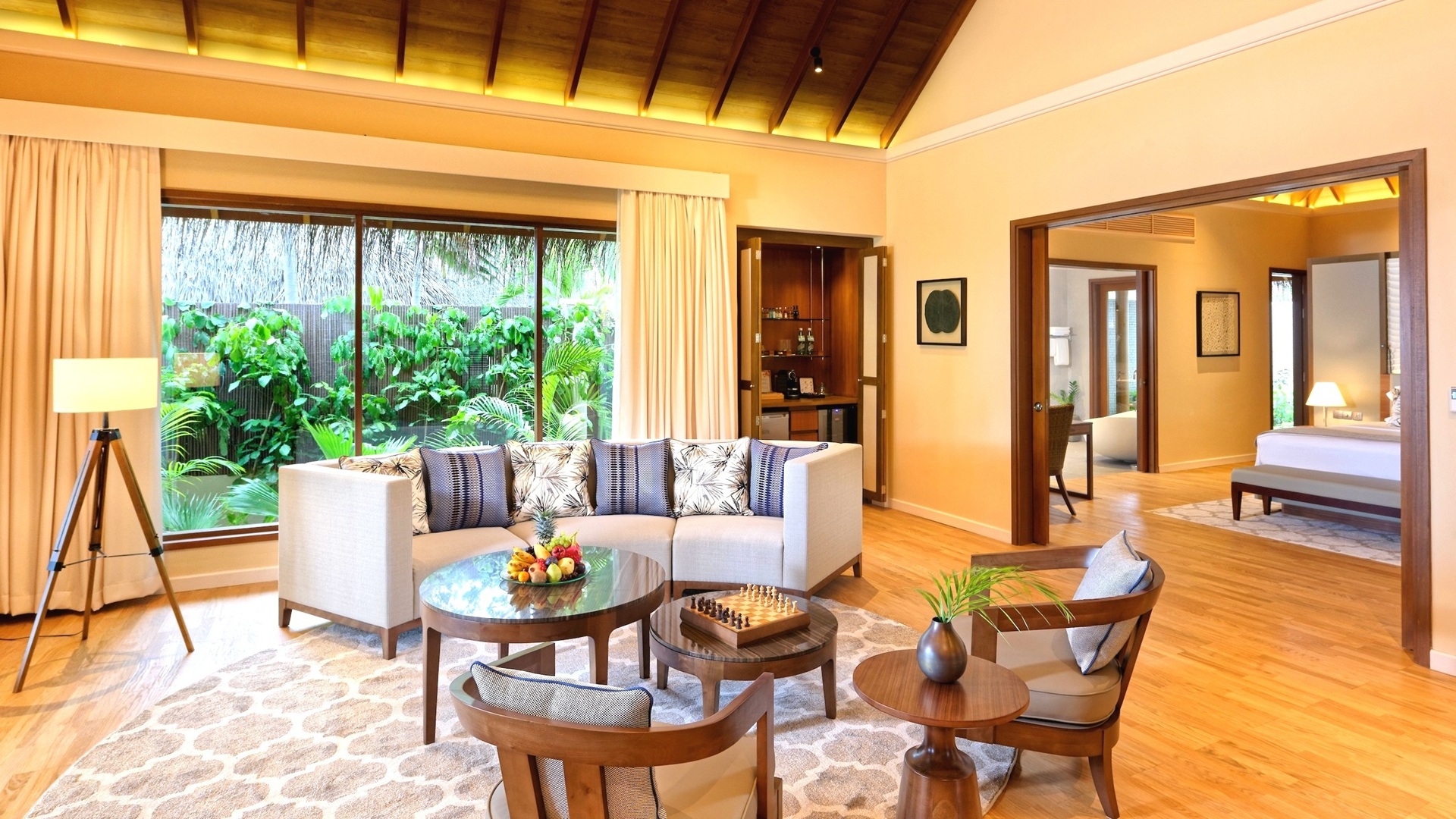 The living area inside a Baros Residence, part of Baros Maldives Villas