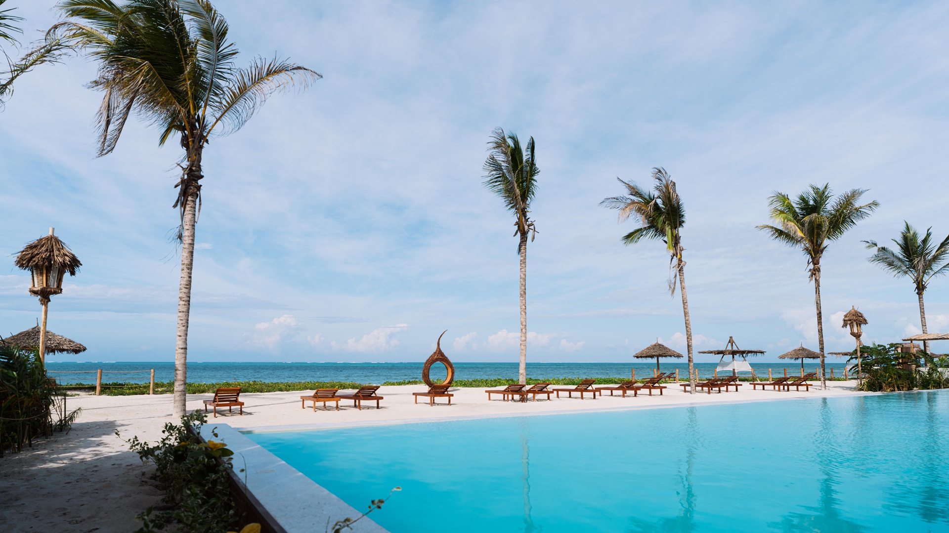 A shot of the main pool, situated next to the beach, at ENVI Paje Zanzibar