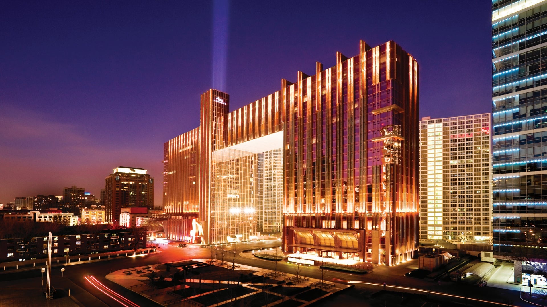 An exterior wide shot in the evening of the Fairmont Beijing, part of Fairmont Renovations