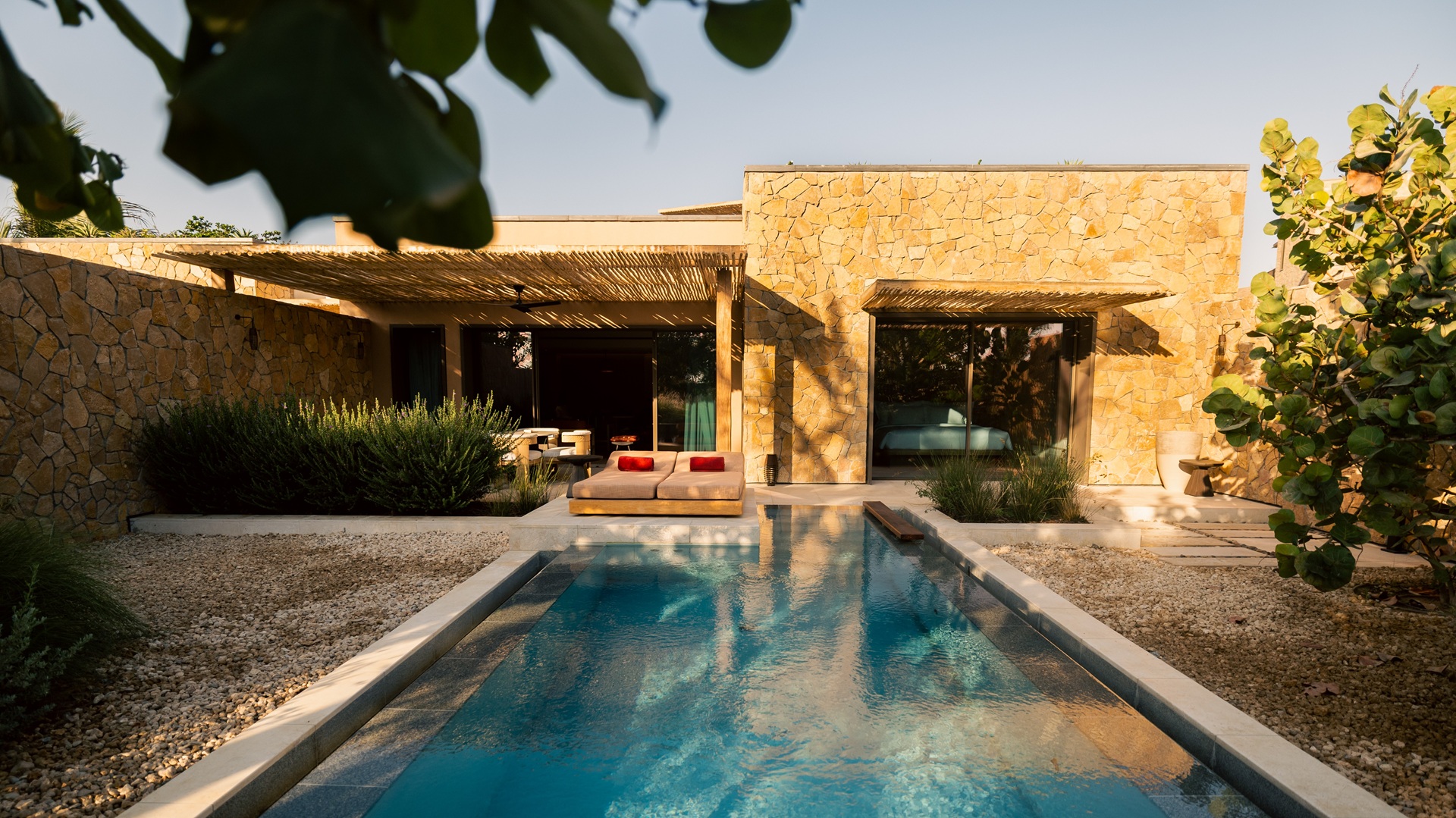 The private swimming pool and the sitting area next to a room at Six Senses AMAALA