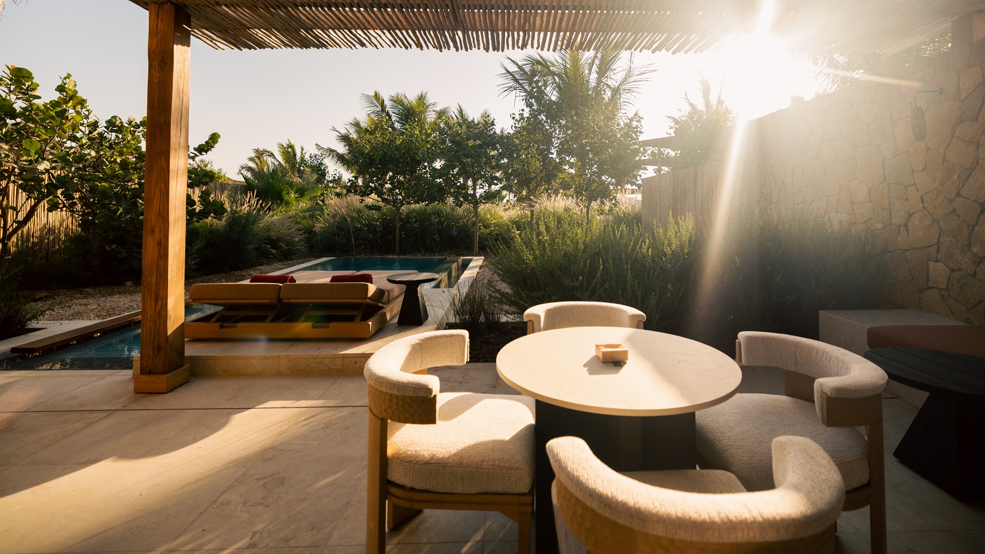 The private swimming pool and the sitting area next to a room at Six Senses AMAALA