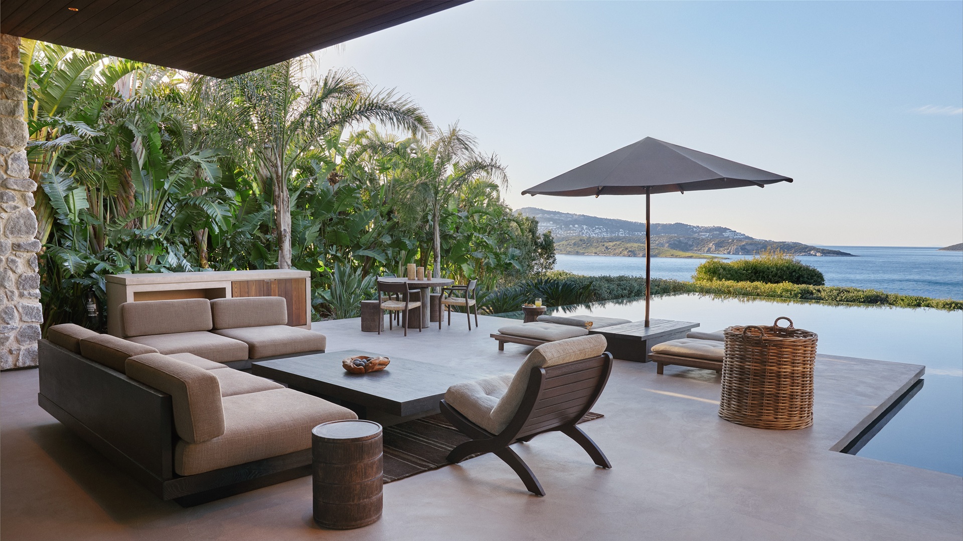 Maxx Royal Bodrum Villas: An image of the sitting areas outside the living room.