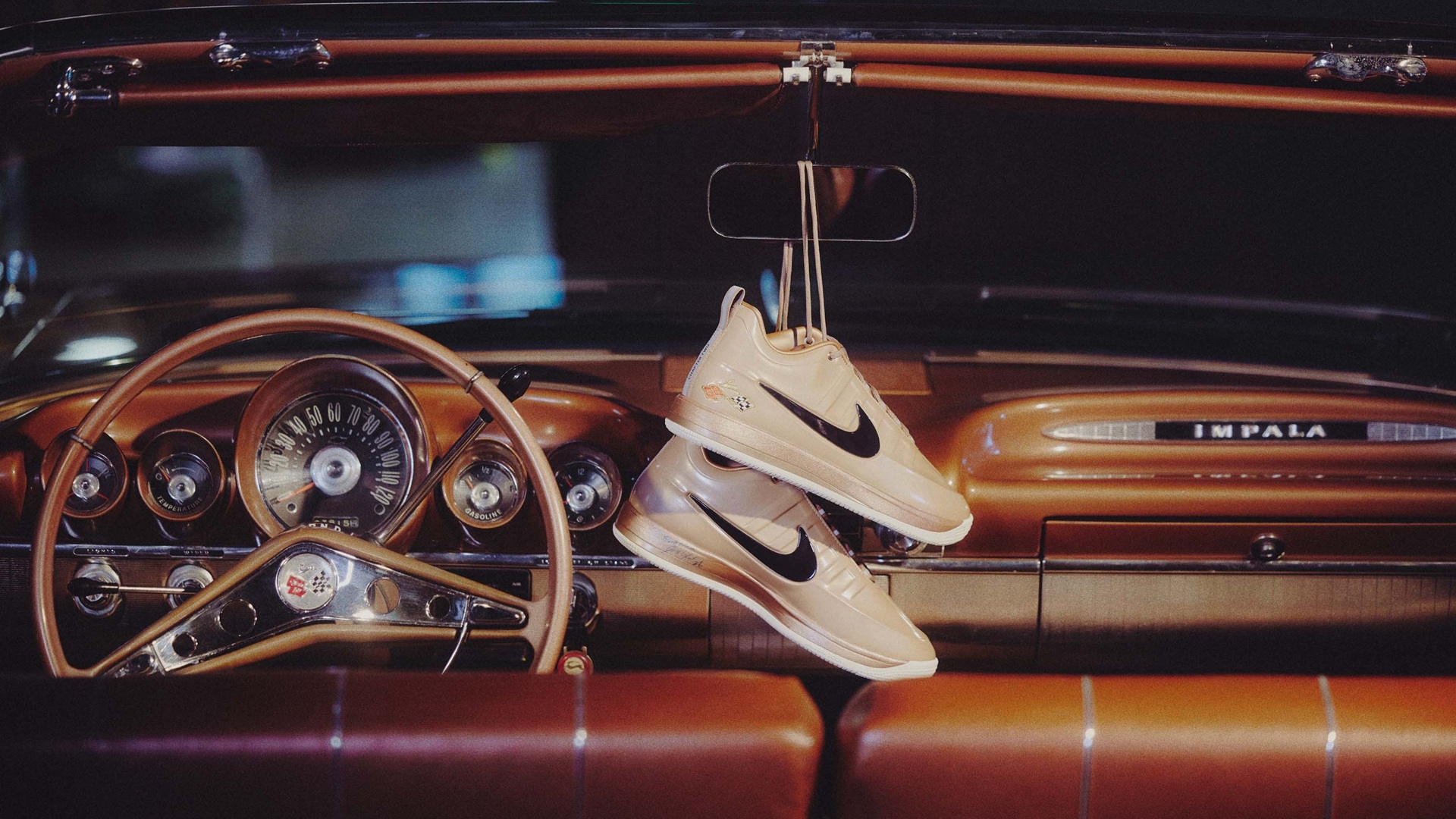Nike Book 2: Pair of sneakers hanging on rearview mirror of ‘Pretty Penny’, Booker’s 1959 Chevrolet Impala