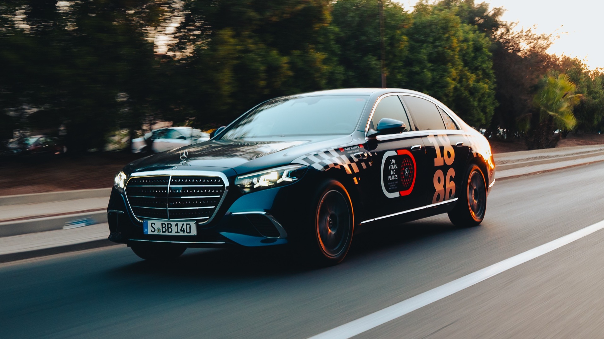 2026 Mercedes-Benz S-Class Review: A dynamic image of the car focusing on the front left section of the exterior.