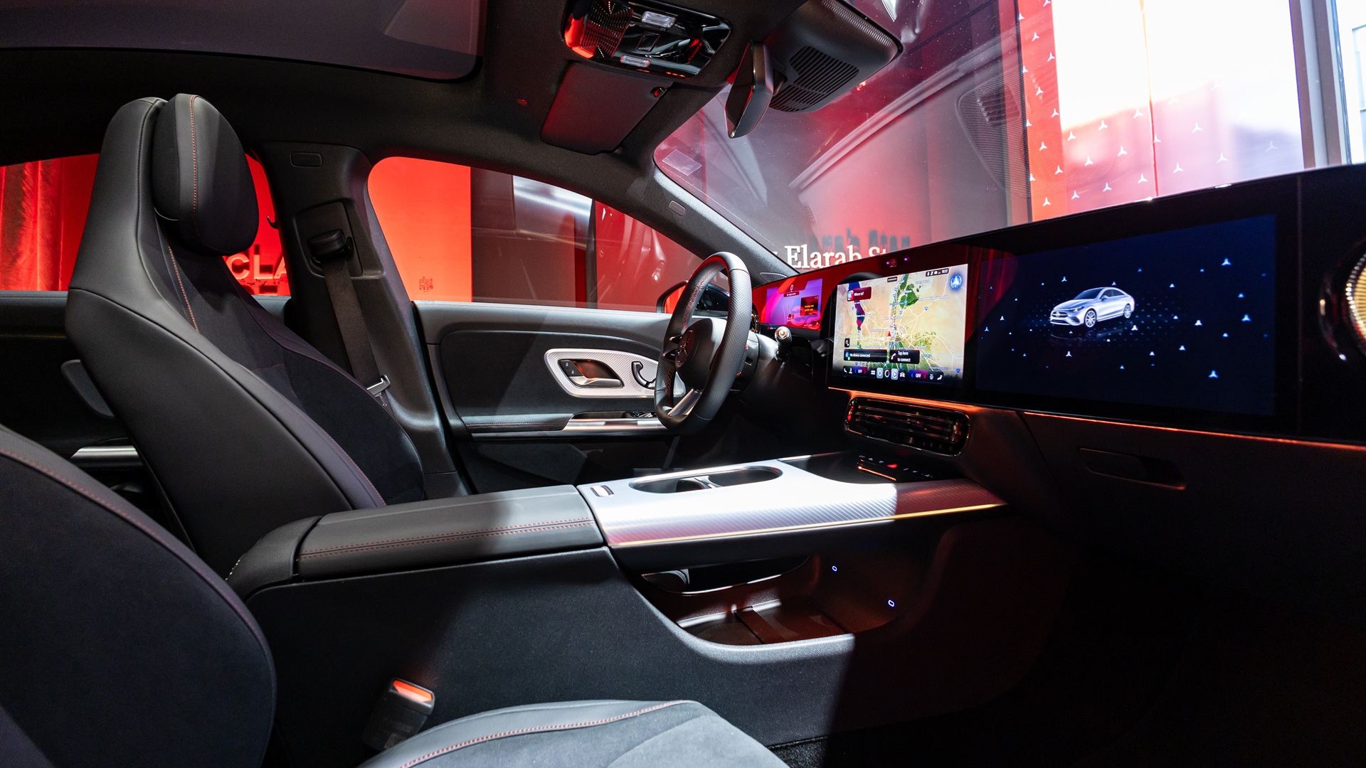 2026 Mercedes-Benz S-Class Review: An image taken from the front-passenger-side door showcasing the front of the cabin