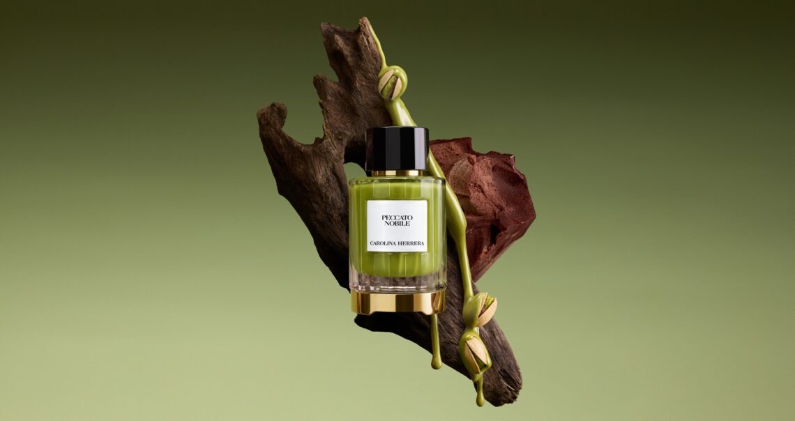 Carolina Herrera Peccato Nobile: A bottle of the scent with the elements of its key notes in the background