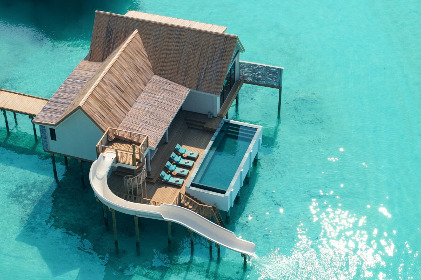 SIX & SIX Private Residences: An aerial exterior shot of the Water Pool Villa at RAH GILI, Maldives